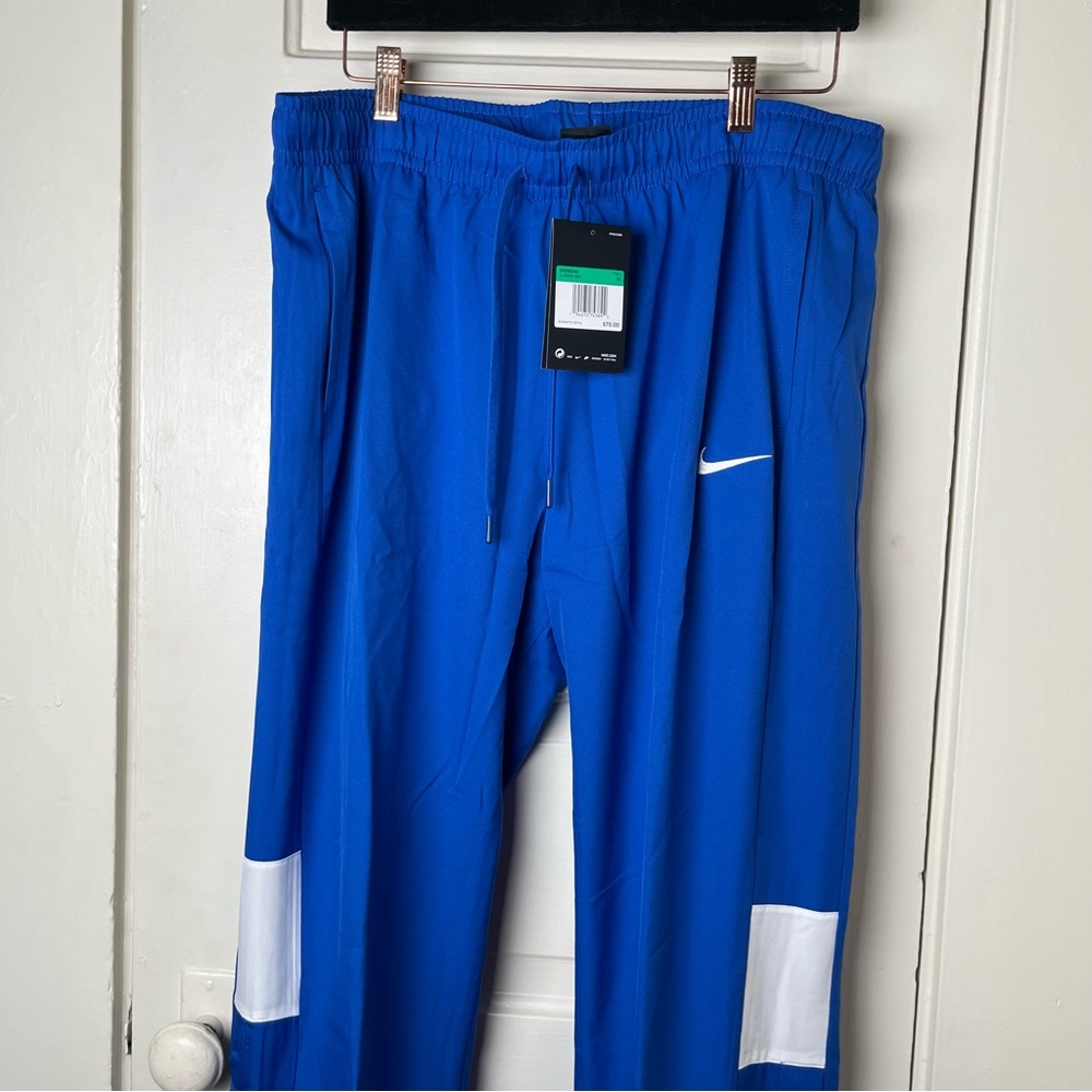 Nike Track Pants Women Activewear  Blue Logo Dri Fit Ankle Snap adjust athletic